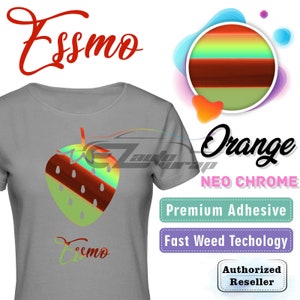 May include: A gray t-shirt featuring a colorful strawberry design with red and green hues. The shirt has the word "Essmo" in red script at the top and bottom. The image also includes a neo-chrome orange graphic and text that reads "Premium Adhesive" and "Fast Weed Technology."