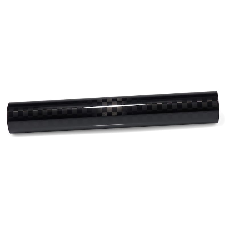 May include: A cylindrical tube featuring a glossy black finish with a repeating dark gray checkerboard pattern. The object has a smooth, reflective surface and a uniform shape, presenting a consistent grid design across its entire length.