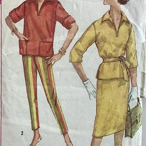 May include: A vintage sewing pattern envelope featuring illustrations of two outfits. One shows a red collared top with pockets and striped pants. The other shows a yellow collared top with a waist tie and a skirt. Text includes 45, 10 cents, J.C. Penney Co. Oakland 7, Calif., 2, 1, and UNIT CONSTRUCTION.