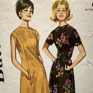 May include: Illustration of two women in vintage dresses. One wears a mustard-yellow sleeveless dress with pockets. The other is in a black dress with a floral pattern. Both are wearing black flats.