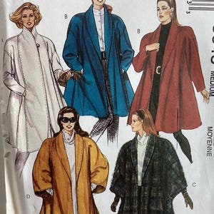 May include: A McCall's sewing pattern envelope featuring illustrations of five different coat styles. The designs include a white coat, a blue coat, a red coat, a mustard yellow coat, and a dark green plaid coat, all with loose, open-front silhouettes.