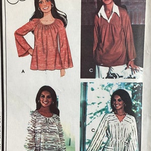 May include: A vintage sewing pattern for a set of tops, labeled "Misses' Set of Tops". The pattern includes three different styles: a loose-fitting top with a tie at the neckline, a top with a gathered neckline and a collar, and a top with a V-neckline and a tie at the waist.