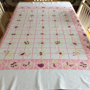 Vintage tablecloth, purple fruit with green leaves on pink grid,   56" x 72"