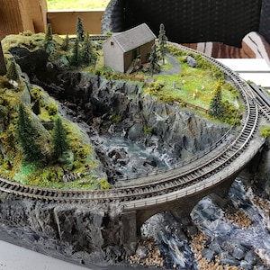 N Gauge micro model railway working display piece.