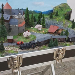 Stunning Briefcase Model Railway and Train. Both a scenic display pieces and working model railway