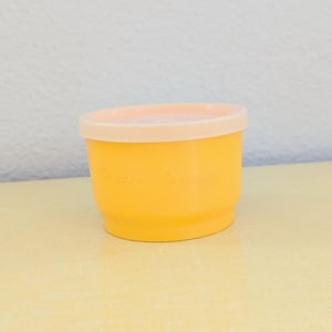 Yellow Tupperware Snack Cup