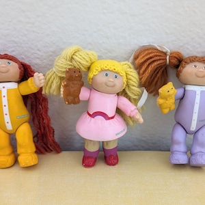Posable Cabbage Patch Kids Doll with Yarn Pig Tails and Teddy Bear