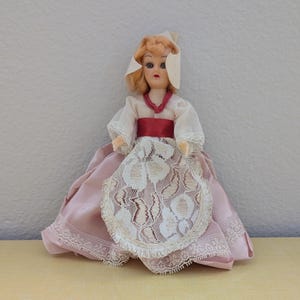Vintage Strawberry Blonde Doll with Pink and White Dress and White Hat
