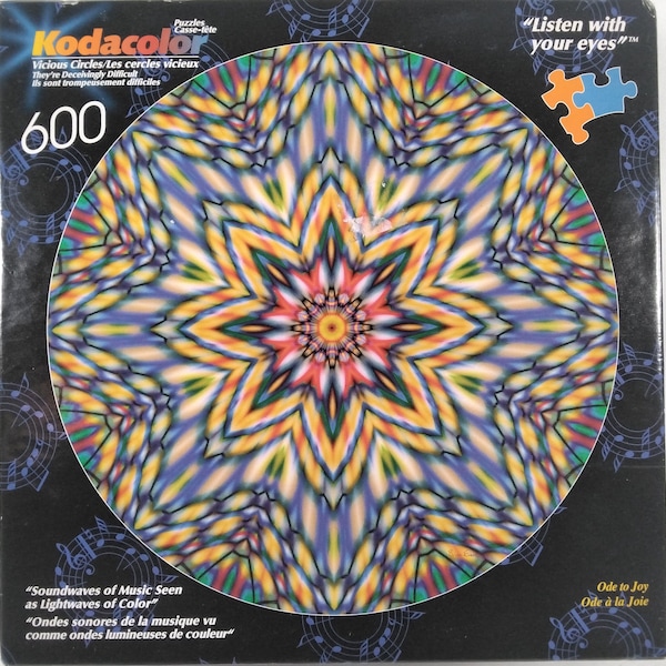 FACTORY SEALED Ode To Joy Vicious Circles Kodacolor Kodak 600 pc Jigsaw Puzzle 24" Diameter Rose Art