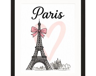 May include: Black framed print featuring a line drawing of the Eiffel Tower with a pink bow and a pink heart. The word "Paris" is written above the tower in a script font. A cityscape is at the bottom.