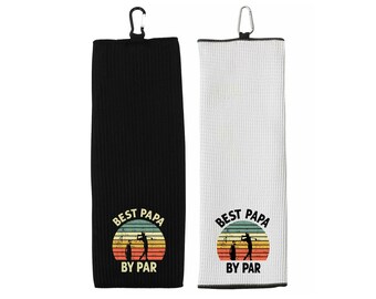 May include: Two black and white golf towels with a vintage-style graphic of a golfer and the text "Best Papa By Par".