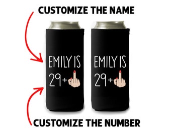 May include: Two black can coolers with white text that reads "Emily is 29+."  The plus sign is followed by a cartoon hand giving the middle finger.  The text "Customize the name" and "Customize the number" are written in red above and below the coolers.