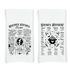 May include: Two black and white kitchen towels with a witchy theme. One towel has a list of kitchen witchery rules and the other has a list of herbs and spices for different intentions.