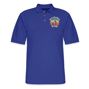 May include: A royal blue polo shirt with a vintage-style graphic of a golfer and the text "Best Grandpa By Par".