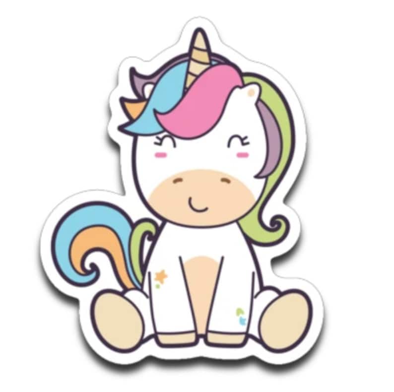 May include: A cartoon unicorn with a rainbow mane and tail, sitting with its legs crossed and a happy expression. The unicorn has a pink horn and a white body with colorful paint splatters.