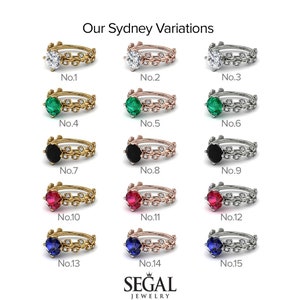 May include: A set of 15 engagement rings with different colored gemstones. The rings are all made of gold, rose gold, or silver. The gemstones are emerald, ruby, sapphire, and black diamond. The rings are numbered 1 through 15.