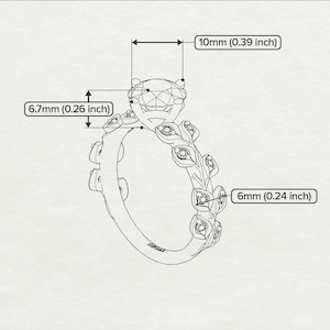 May include: A silver ring with a large, clear, round gemstone surrounded by smaller gemstones. The band is decorated with leaf-like designs. The ring measures 0.39 inches in diameter and 0.26 inches in height.