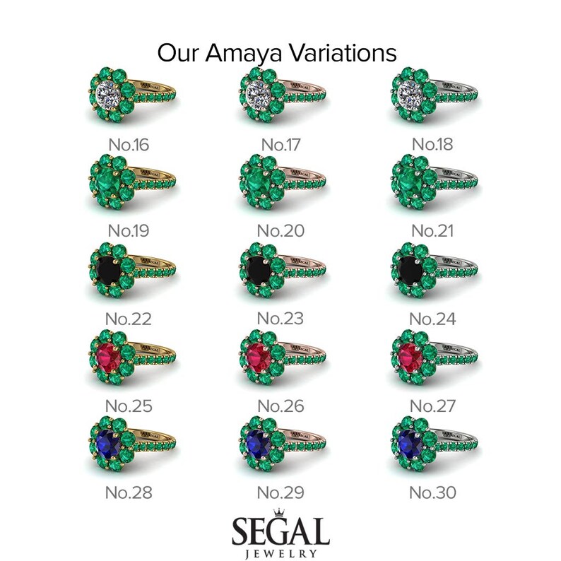 May include: Amaya engagement ring variations with different center stones. The rings feature a halo of emerald green stones surrounding a center stone. The center stones include a round brilliant diamond, a black diamond, a ruby, and a sapphire. The rings are available in yellow gold, rose gold, and white gold.