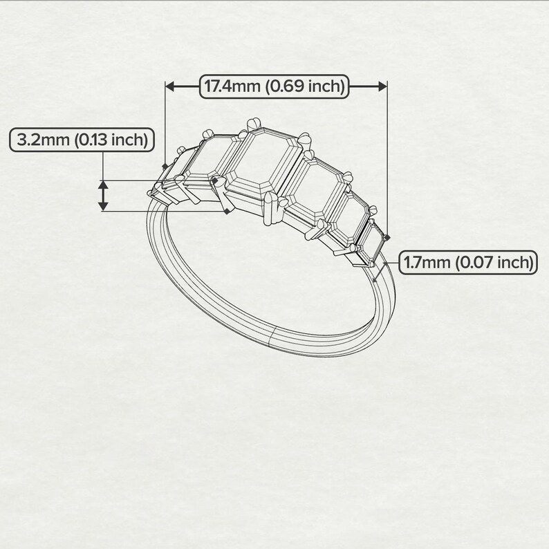以下が含まれることがあります： エメラルドカットの宝石が3つ付いたシルバーリング。リングの幅は17.4mm、高さは3.2mm。バンドの幅は1.7mmです。