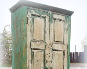 Solid ,rustic , heavy and sturdy two door cabinet