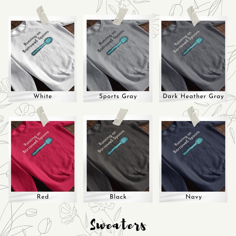 May include: Six different color sweatshirts with the text "Running on Borrowed Spoons" and a blue spoon graphic printed on the front. The colors are white, sports gray, dark heather gray, red, black, and navy.