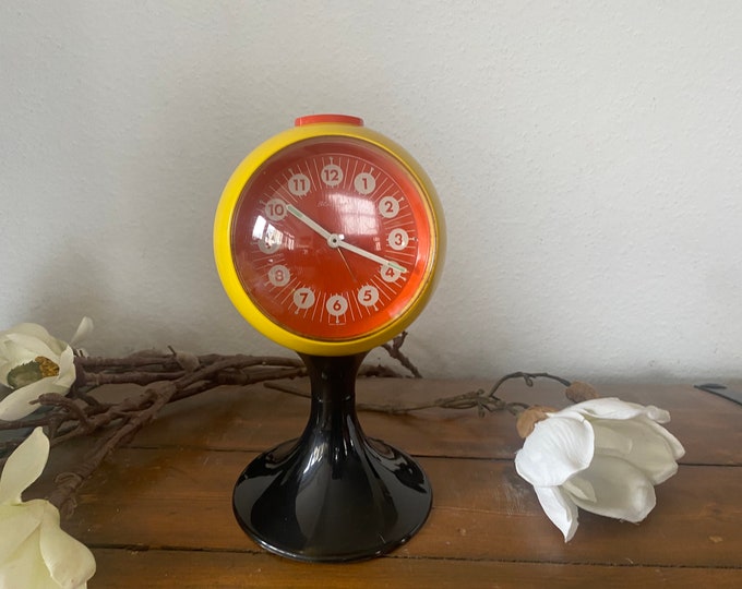 Rare vintage tulip foot space age alarm clock by Blessing, in yellow and black