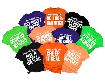 May include: Ten different Halloween-themed t-shirts with white text on various colored shirts. The text on the shirts reads: "Most likely to..." followed by a humorous Halloween-themed phrase. The shirts are arranged in a circle.