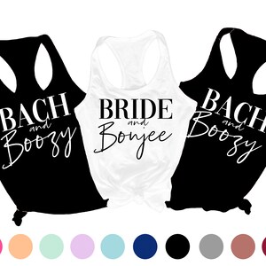 May include: Three black tank tops with white text. The text on the tops reads "Bach and Boozy", "Bride and Bonjee", and "Bach and Boozy".