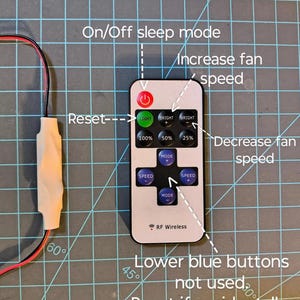 May include: A white RF Wireless remote control with multiple buttons, including power, light, and speed controls. Text on the remote indicates functions like "Increase fan speed" and "Decrease fan speed." Instructions for the controller are also visible.