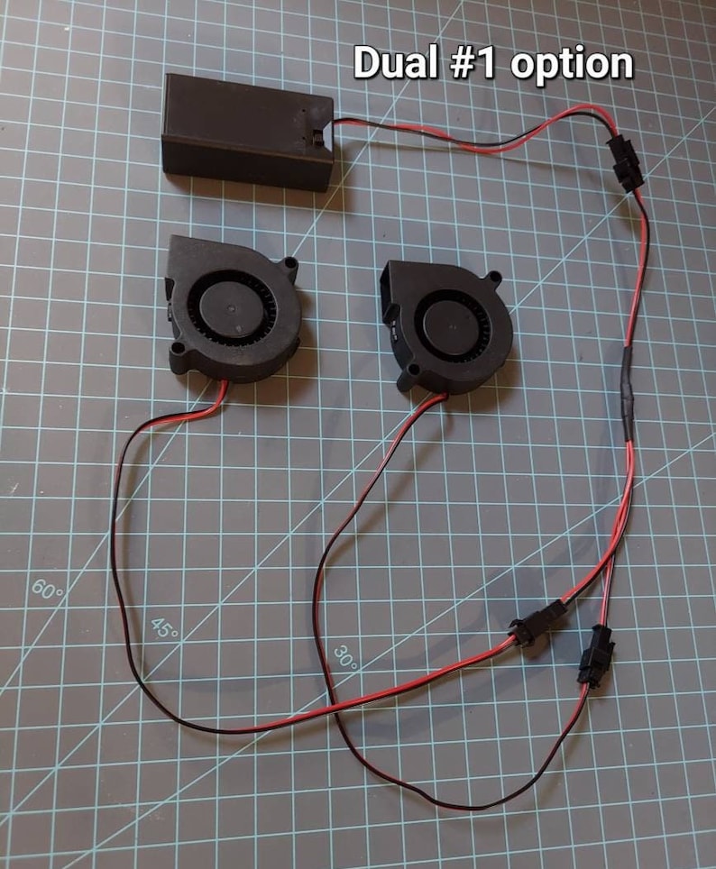 May include: Dual #1 option for a DIY project with two black fans, a black battery pack, and red and black wires.