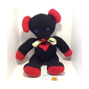 black and red teddy bear