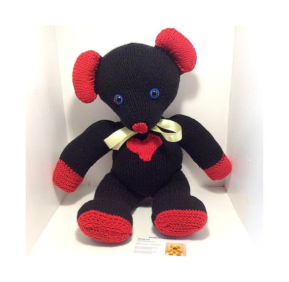 black and red teddy bear