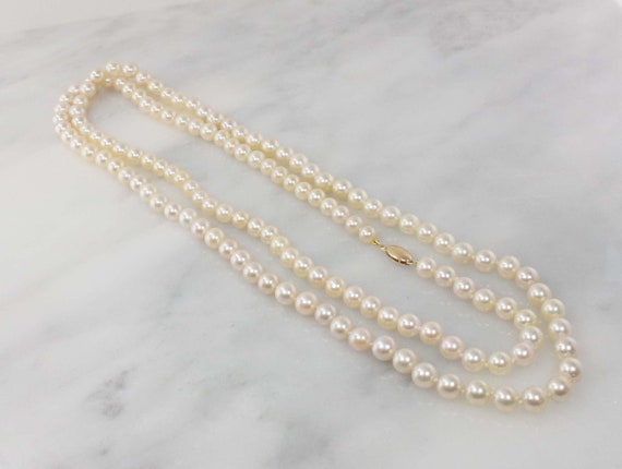 Pearl long hot sale strand necklaces
