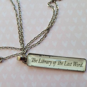 Library of The Last Word pendant necklace made with Invisible Life of Addie LaRue book pages