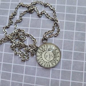 Sun and Moon 20mm pendant necklace made with The Cruel Prince book pages