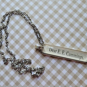 Dear EE pendant necklace made with Love Letters to the Dead book pages