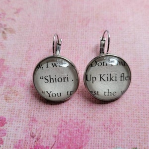 Shiori and Kiki pendant earrings made with Six Crimson Cranes book pages