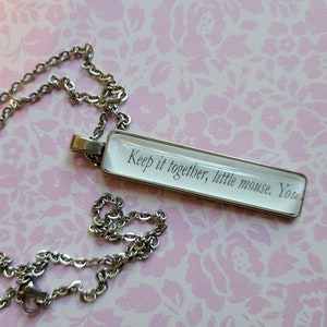 Keep It Together pendant necklace made with Haunting Adeline book pages