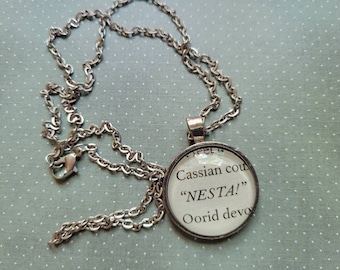 Nesta pendant necklace made with Court of Silver Flames book pages