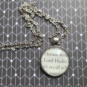Lord Hades pendant necklace made from Touch of Darkness book pages