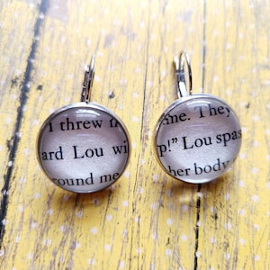 Louise Le Blanc pendant earrings made with Serpent and Dove book pages