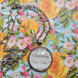 Charming pendant necklace made from Neon Gods book pages