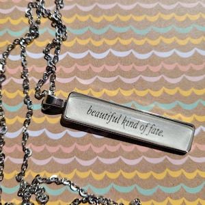 Beautiful Kind of Fate pendant necklace made with Archer&#39;s Voice book pages