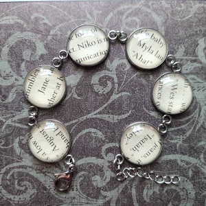 August&#39;s Family pendant bracelet made with One Last Stop book pages