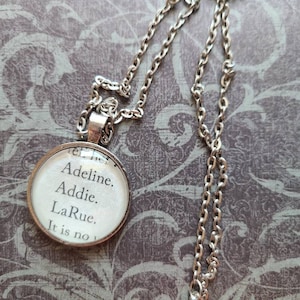 Name pendant necklace made with Invisible Life of Addie LaRue book pages