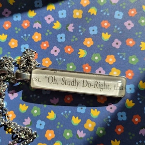Studly Do Right pendant necklace with from Things We Hide From the Light book pages