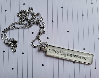 Nothing Can Break Us pendant necklace made from Court of Silver Flames book pages