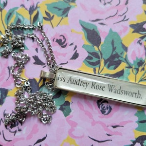 Audrey Rose Wadsworth rectangle pendant necklace made with Stalking Jack the Ripper book pages