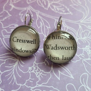 Cresswell and Wadsworth pendant earrings made with Stalking Jack the Ripper book pages
