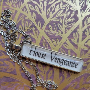 House Vengeance pendant necklace made with Kingdom of the Feared book pages